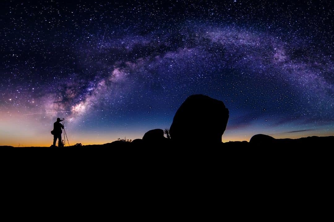 photographer and the milky way