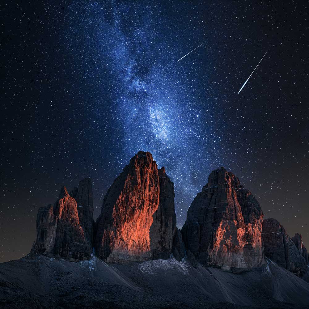 dolomites mountain at night with the milky way in the background
